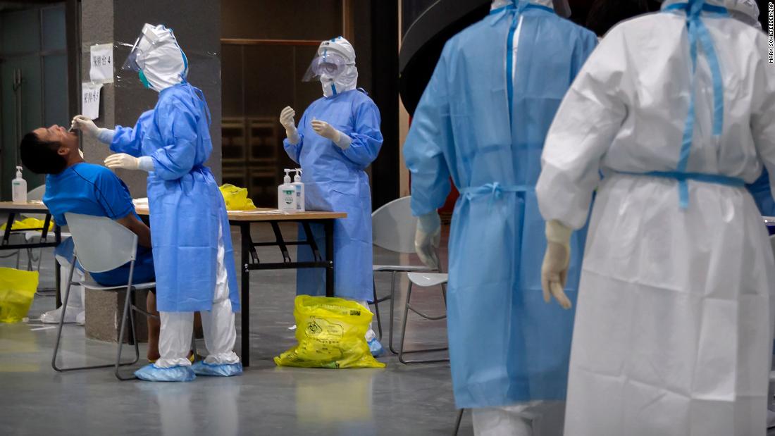 A man has his throat swabbed June 17 at a Covid-19 testing site for those who were potentially exposed to the coronavirus at a wholesale food market in Beijing. For 55 days, the Chinese capital had not reported any locally transmitted infections, but &lt;a href=&quot;https://www.cnn.com/2020/06/18/asia/beijing-coronavirus-reminder-intl-hnk/index.html&quot; target=&quot;_blank&quot;&gt;a fresh cluster of coronavirus cases emerged&lt;/a&gt; from a sprawling wholesale food market in the city, infecting more than 180 people as of June 19.